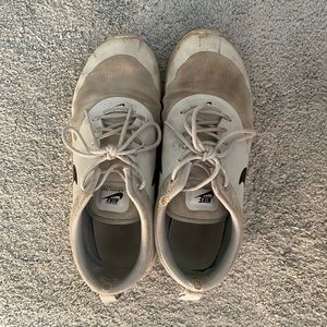 Well-worn ladies nike sneakers